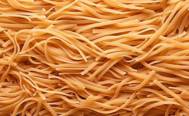 Freshly cooked homemade strand pasta, specifically spaghetti, to create a texture suitable for use as a background or wallpaper