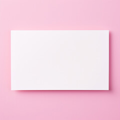 Blank white card isolated on pink pastel color background