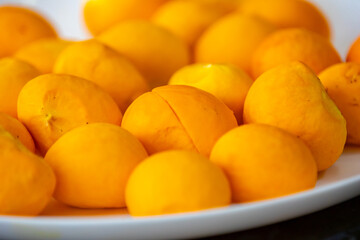 Typical ripe pequi fruit (caryocar brasiliense) in fine details and selective focus. Typical fruit from the Brazilian cerrado bioama.