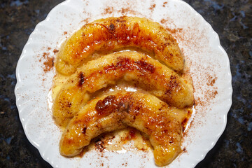 Traditional banana flambéed in butter and cinnamon powder