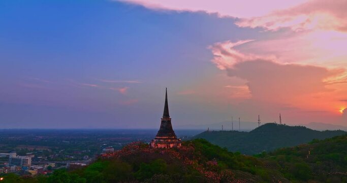 .aerial view The rays of the sun shine on the top of the castle. .The rays of the sunset pierced through the palace. .amazing cloud in bright sky at sunset above the palace on hilltop.
