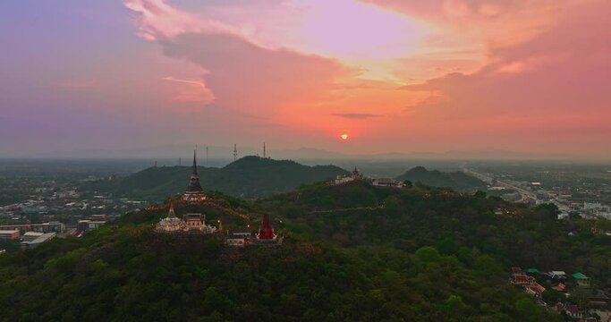 .Aerial view Huge, brightly colored clouds curled into a spiral above the castle..amazing cloud in bright sky at sunset above the palace on hilltop.Phetchaburi city background. cityscape background