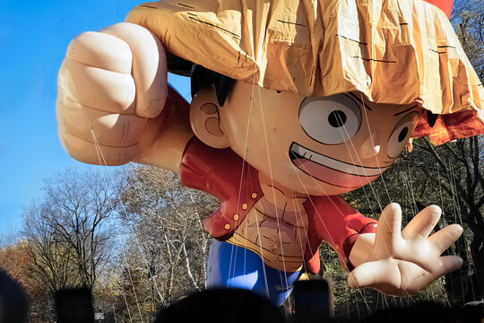 New York, NY - November 23, 2023: 
Macy's Thanksgiving Day Parade balloon of world famous Japanese manga and anime character, Mugiwara no Monkey D. Luffy
