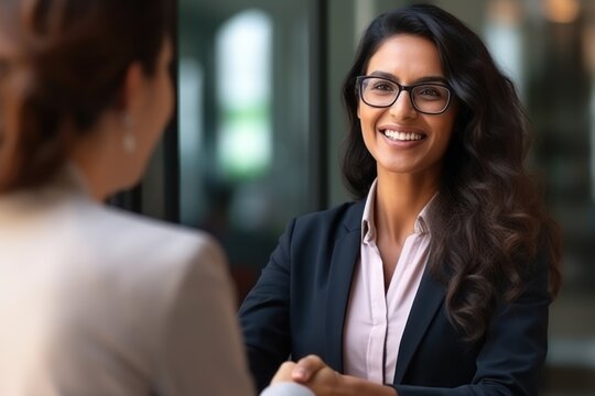 Successful Job Interview: Indian Manager Welcomes New Recruit generative ai