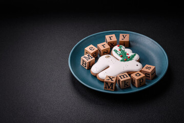 Beautiful Christmas composition with copy space with an inscription in wooden cubes