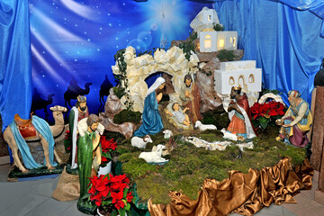 Traditional Christmas nativity scene with Mary and Joseph and baby Jesus in the manger.