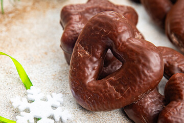 chocolate gingerbread christmas cookies heart shape, star spicy taste christmas sweet dessert holiday treat new year and christmas celebration meal food snack on the table copy space food background