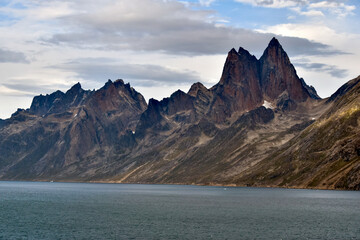 Jagged peaks along the shore of Prince Christian Sound, Greenland