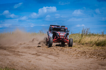 Fototapeta premium UTV buggy and 4x4 offroad in sandy track. Rally extreme riding