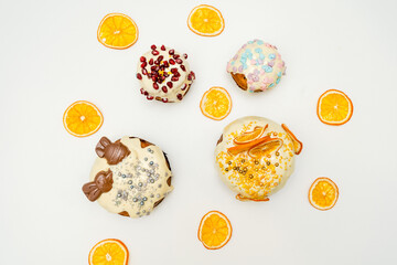 Traditional easter cake with fruits and painted colored eggs. Easter baking. Spring holiday.