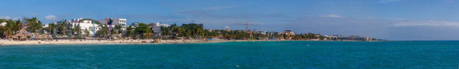 Fototapeta na wymiar Playa del Carmen, Quintana Roo, Mexico, January 29nd, 2023: Panorama of the beach