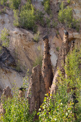 Close up of rock formation of soil figures and mineral water springs, The Devil’s Town (Đavolja varoš), southern part of Serbia, on the slopes of Radan mountain.