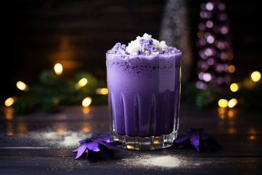 Purple cocktail with ube on the rocks with ice cubes. Winter christmas trendy drinks