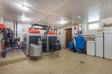 Autonomous gas boiler house with special equipment installed. Pipe system with sensors, switches...