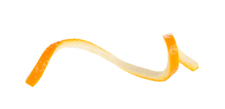 Orange twist isolated on a white background. Orange peel close-up. Orange citron.