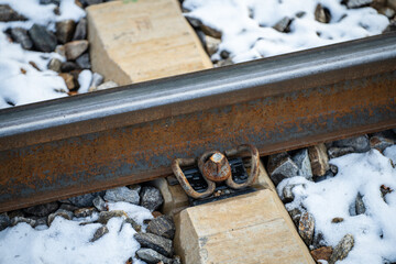 railway train track in the frost detail on the landscape background