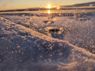 Hard frost. Sunset over the frozen river. Snowdust. High quality photo