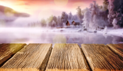 empty wooden table for product presentation blurred winter landscape
