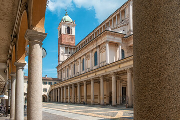 View of Piazza della Repubblica square with Novara cathedral, Piedmont, Italy. Cattedrale di Santa Maria Assunta with colonnade gallery. Travel destination