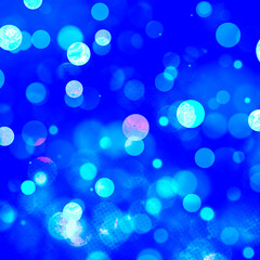 Blue bokeh lights background for seasonal, holidays, event celebrations and various design works