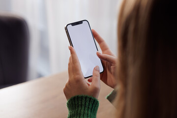 girl communicates via video chat at the table, online learning