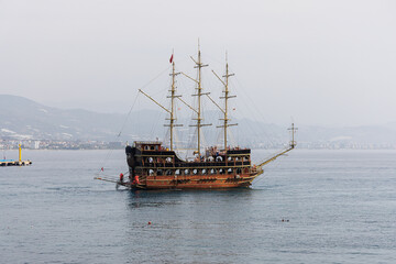 Turkish pirate old ship with tourists in Alanya, Turkey.