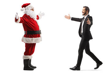 Santa claus meeting a young happy businessman