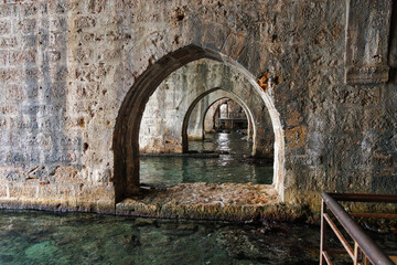 Inside the old shipyard of Alanya, Turkey. We see the arches.