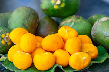 Typical ripe pequi fruit (caryocar brasiliense) in fine details and selective focus. Typical fruit...