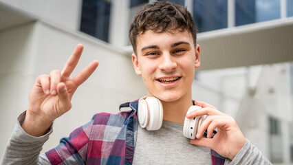 portrait of young Caucasian man teenager 18 or 19 years old outdoor