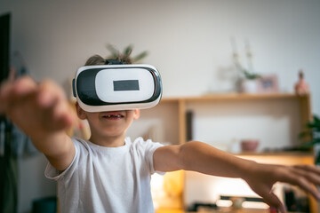 boy male caucasian child at home enjoy virtual reality VR headset