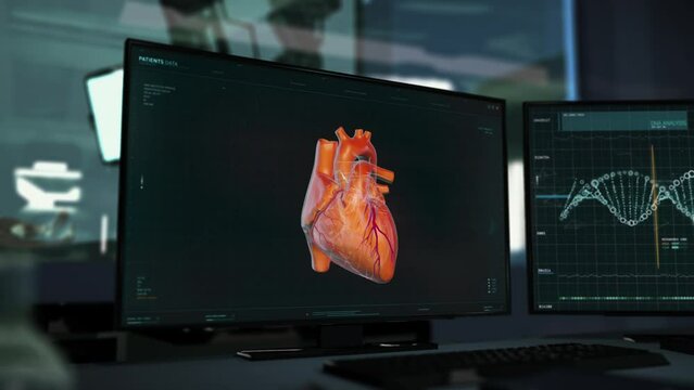 X-ray scanner is used for the analysis of the patients heart at the hospital. X-ray is scanning the virtual projection of a heart. X-ray scanner identifying the dangerous illness in a patients heart