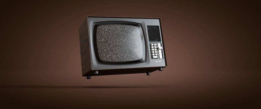 téléviseur vintage acier et métal en lévitation sur un fond orange, bruit dans l'écran