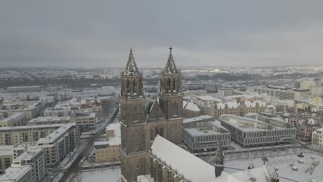 Magdeburg Cathedral in winter snow - drone view