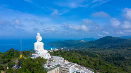blue sky and blue ocean are on the back of Phuket Big Buddha statue.white Phuket big Buddha is the one of landmarks on Phuket island...