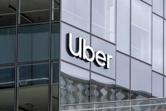 Uber sign on its headquarters building in San Francisco, California, USA - June 6, 2023. Uber Technologies is a transportation conglomerate.