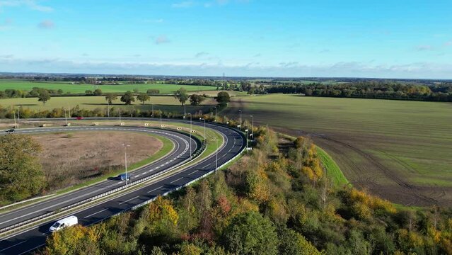 High Angle Footage of British Motorways and Traffic Passing Through Countryside of Hemel Hempstead England UK.