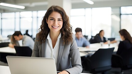 smiling businesswoman with laptop working together in office, picture for website 