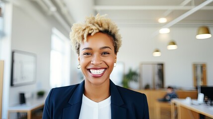 portrait of a smiling businesswoman, successful african american, office background