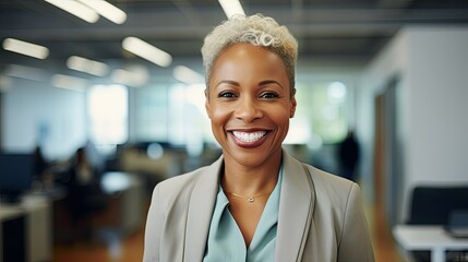 portrait of a smiling female expert, professional and successful black woman looking at a camera, businesswoman on office background