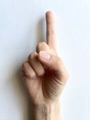 ジェスチャー　人差し指を立てる