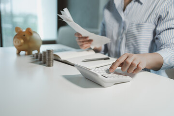 The operator is checking the purchase receipt, Finance employees are calculating various expenses...