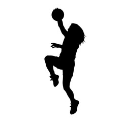 Silhouette of a female athlete doing basket ball pose. Silhouette of a woman basket ball player in action pose.