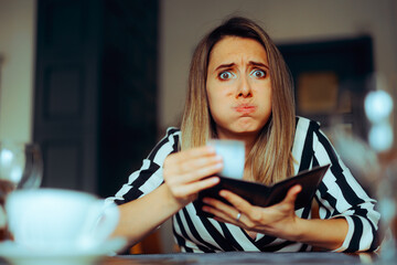 Unhappy Woman Receiving an Overpriced Bill in a Restaurant. Unhappy customer getting an inflated...