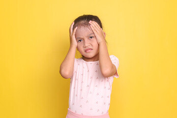 Dizzy girl holding head suffering from headache and tired 