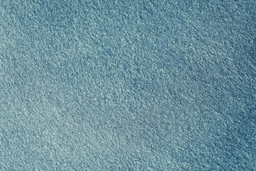 Blue sea felt fabric background. Surface of fabric texture in blue sky color 