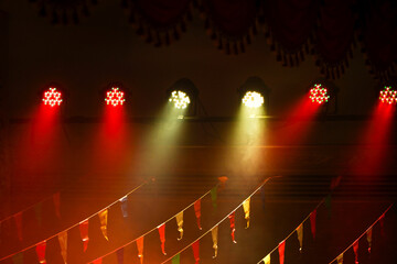 Stage lights on a concert in a theater, Stage lights and smoke stage during concert. Several...