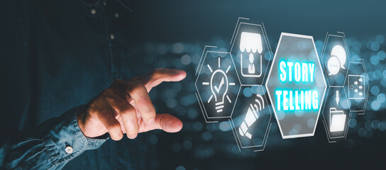 Story telling concept, Businessman hand touching story telling icon on virtual screen.