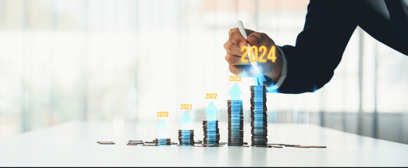 Growth coin stack symbolizing business investment and economic growth. Business people doing financial planning to achieve financial goal and contribute maximum profit on new year 2024 . Shrewd - obrazy, fototapety, plakaty