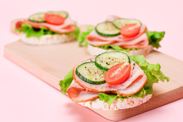 Light Breakfast. Quick and Healthy Sandwiches. Rice Cakes with Ham, Tomato, Fresh Cucumber and...